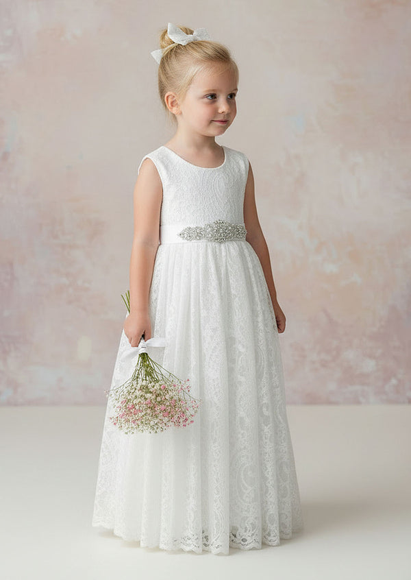Perfect for Summer months our Elizabeth sleeveless lace flower girl dress is sure to be a winner. All over white lace bodice and skirt with feathered lace V-back. Bodice front and skirt is soft cotton lined.