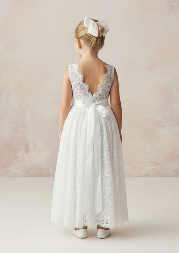 Perfect for Summer months our Elizabeth sleeveless lace flower girl dress is sure to be a winner. All over white lace bodice and skirt with feathered lace V-back. Bodice front and skirt is soft cotton lined.