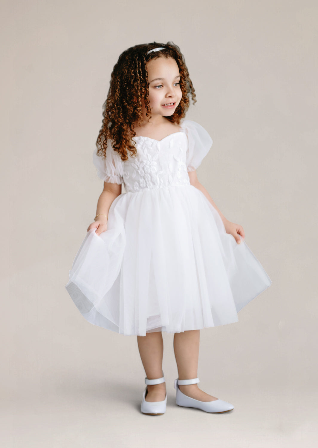 Knee length white flower girl dress