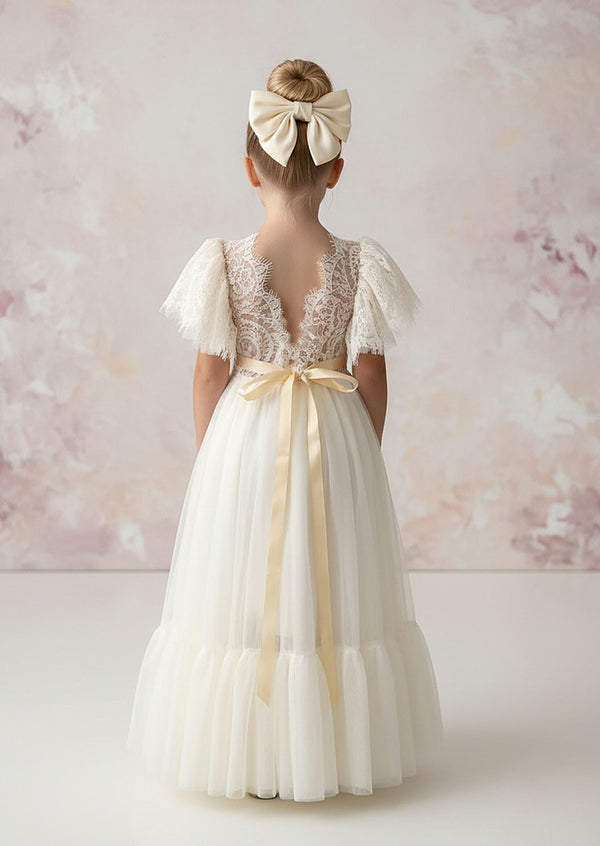 Our elegant ivory rustic lace boho flower girl dress brings elegance to special occasions and compliments barn venues, forest or countryside weddings, with style. 