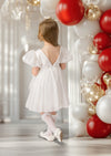 Girls’ first communion dress in white with cap sleeves and full skirt