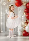 White communion gown with lace overlay and satin sash for young girl