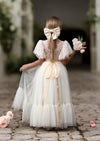 Our elegant ivory rustic lace boho flower girl dress brings elegance to special occasions and compliments barn venues, forest or countryside weddings, with style. 