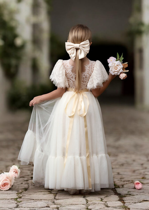 Our elegant ivory rustic lace boho flower girl dress brings elegance to special occasions and compliments barn venues, forest or countryside weddings, with style. 