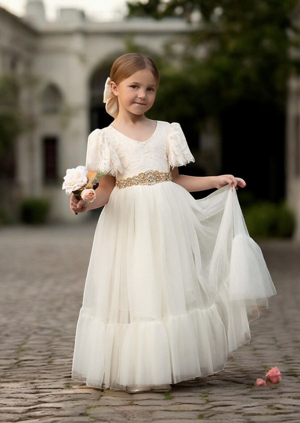 Our elegant ivory rustic lace boho flower girl dress brings elegance to special occasions and compliments barn venues, forest or countryside weddings, with style. 
