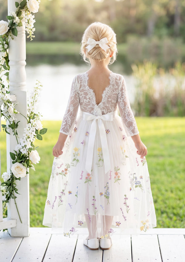 White floral tulle and lace flower girl dress with sleeves