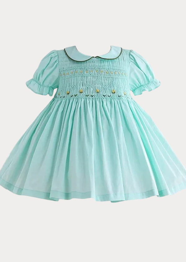 green smocked baby dress