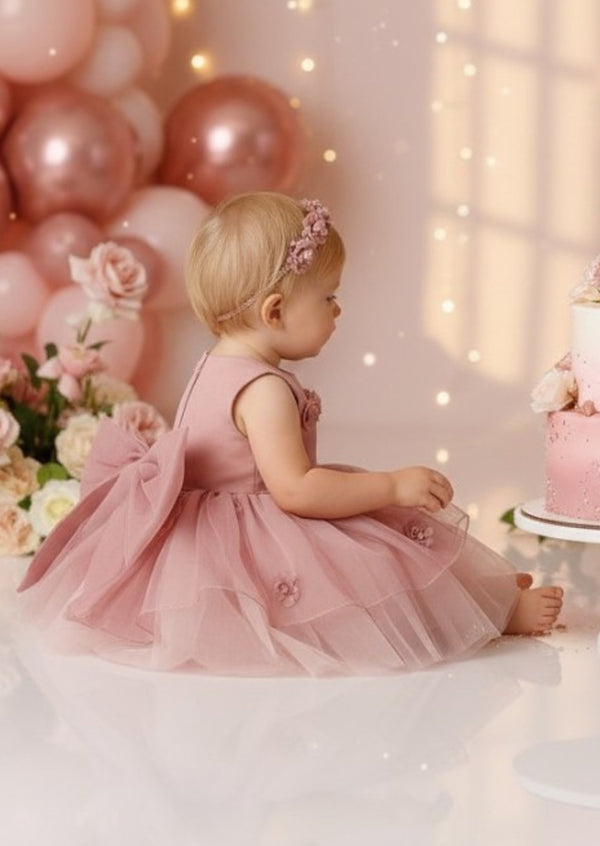 Baby Girl Pink Birthday Party dress with illusion neckline and applique flowers side view
