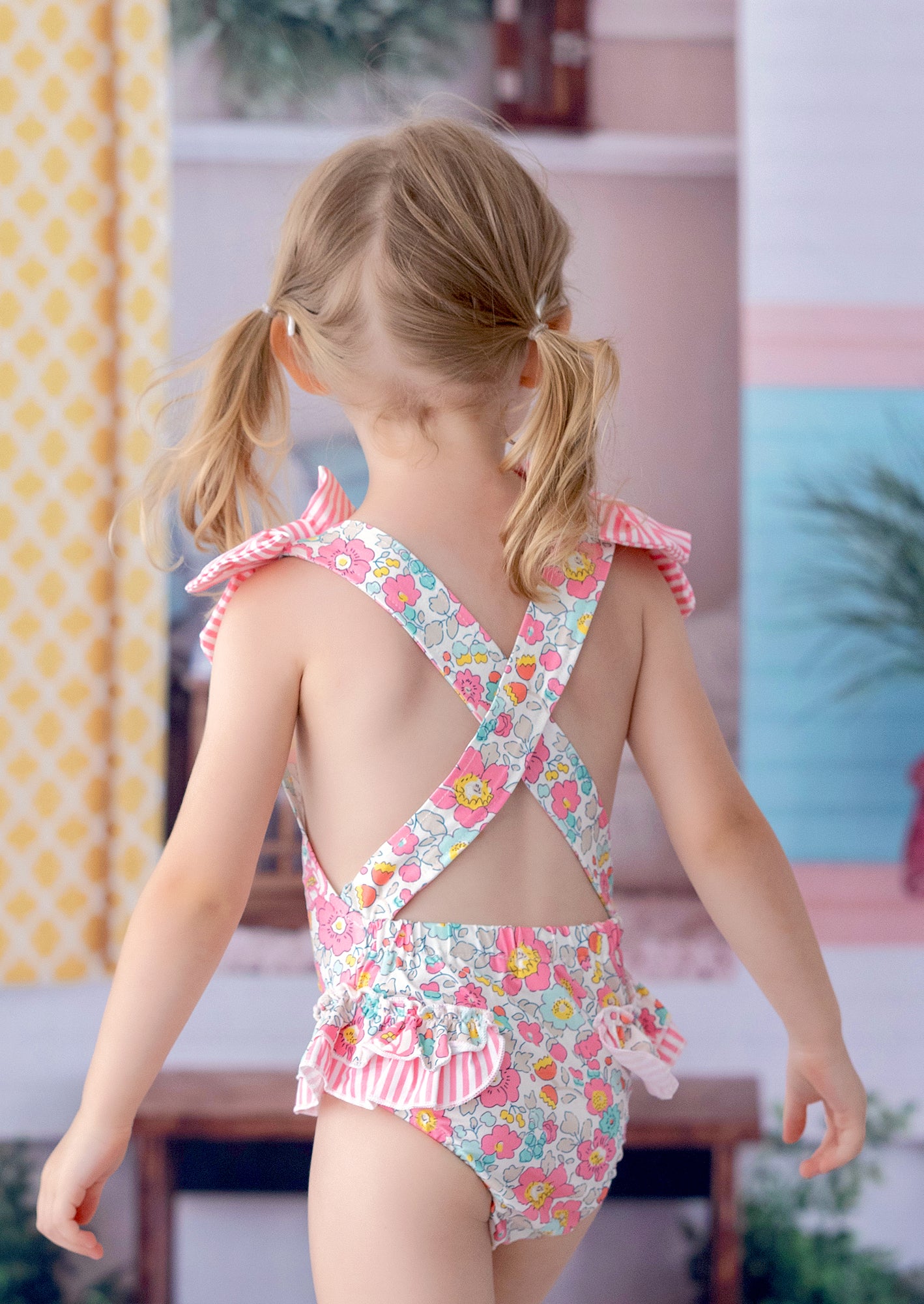 Girls’ Baby Toddler & Girls Pink floral swimsuit with pink forget‑me‑nots, bows, and cross‑back straps