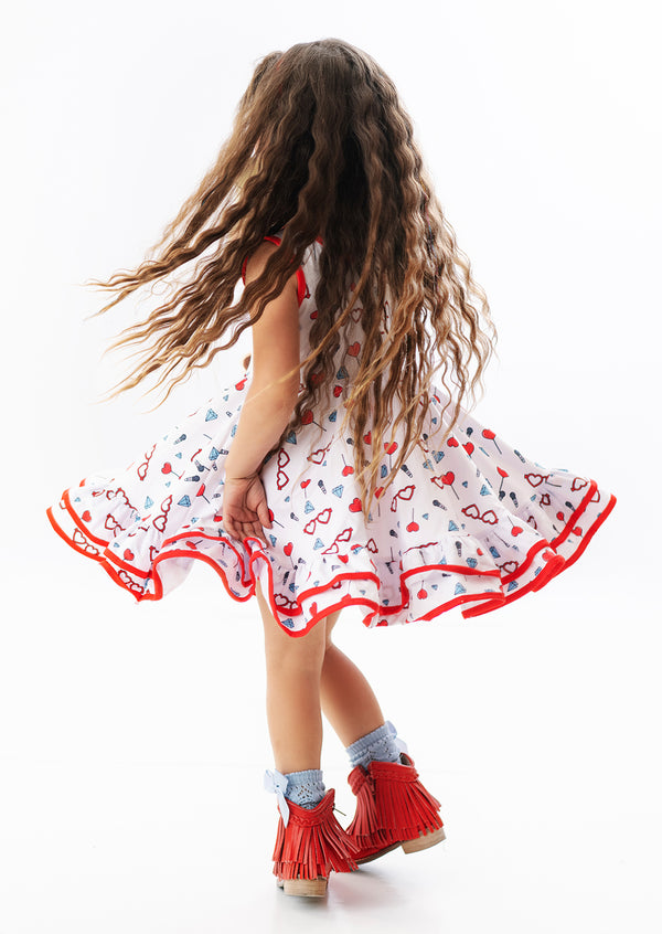 Little girls twirl dresses