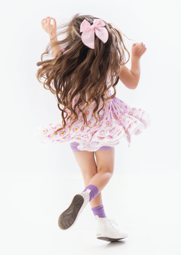little girl twirling