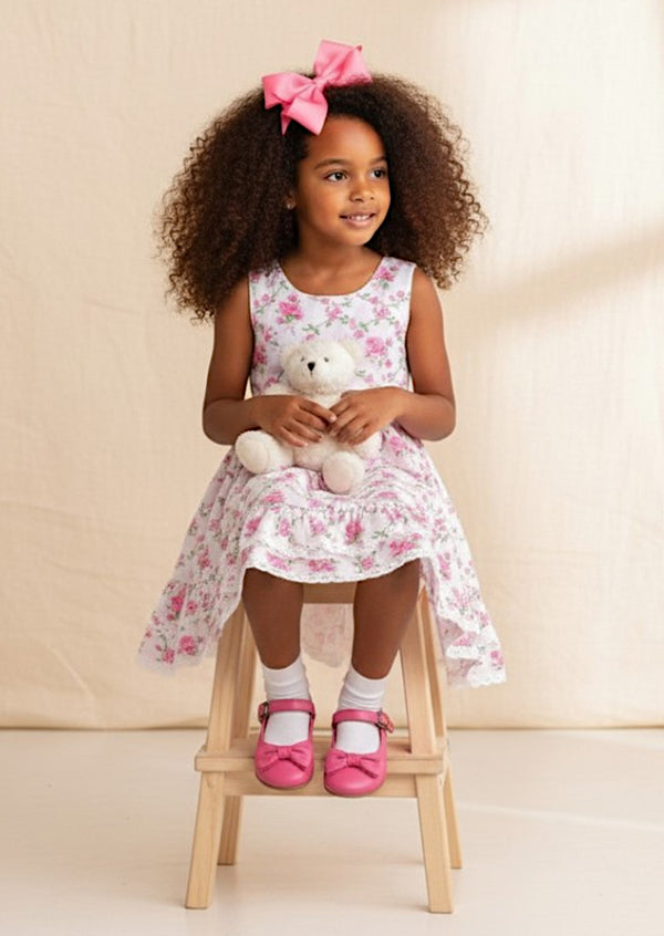 Coordinates beautifully with pink bows and white shoes