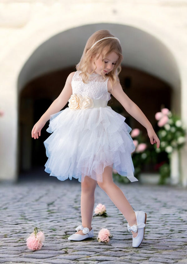 White knee length tulle flower girl dress with satin flower sash