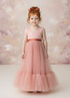 sleeveless coral flower girl dress with ruffle hem