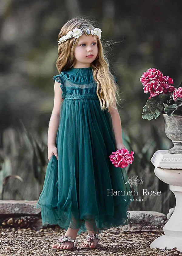Deep green knee-length girls dress, trendy and unique, suitable for any occasion