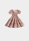 Layla Ditsy Pink Floral Dress with wide tiered skirt, poufy sleeves, and elastic bodice in rose pink cotton blend