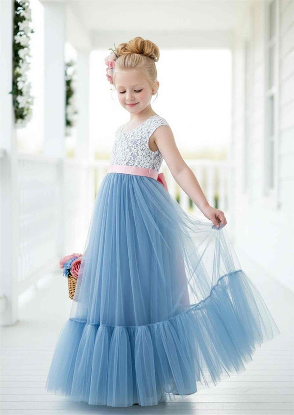 Dusty blue mermaid-style flower girl dress with white lace bodice and layered tulle trumpet-flounce skirt