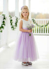Lavender sleeveless Celine flower girl dress with lace bodice, flowing tulle skirt, and feathered V-lace back
