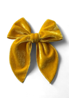 Hand tied bow in gold velvet