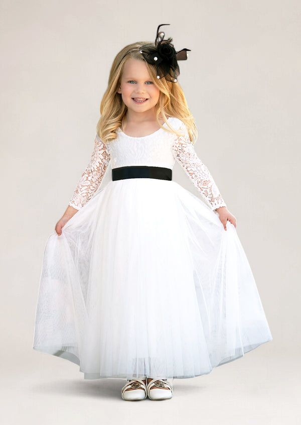 white toddler flower girl dress with sleeves and a black ribbon bow sash