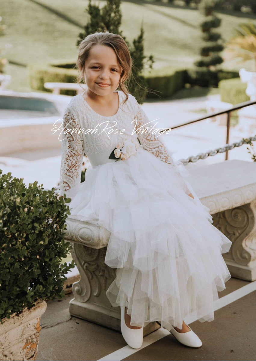 white layered flower girl dress with sleeves