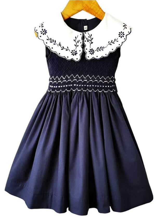Carla Embroidered Smocked Dress in Navy - 