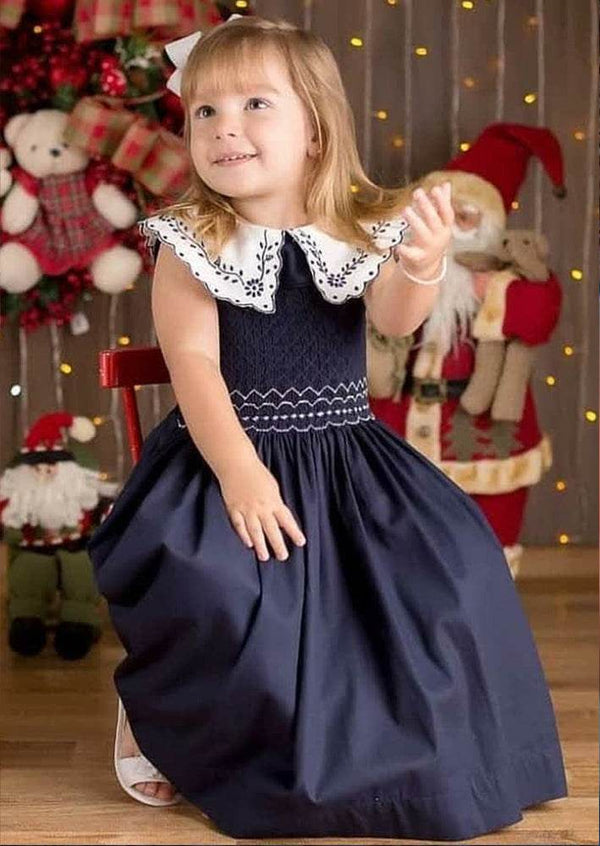 Carla Embroidered Smocked Dress in Navy - 