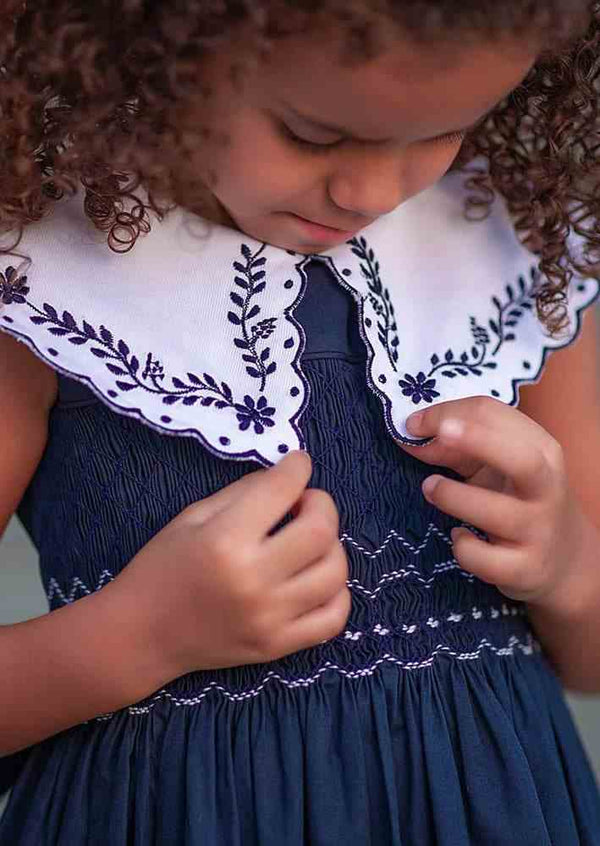 Carla Embroidered Smocked Dress in Navy - 