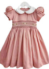 Marcella Smocked Dress in pink with hand smocked bodice and ruffle sleeves
